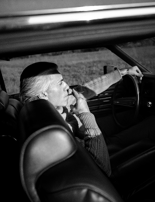 Man in car - Carnault Electric Cigarette Luxury Swiss style luxury smoke